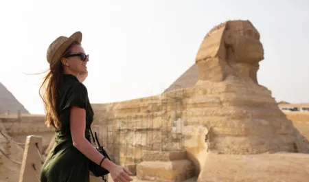 A young woman in front of the Sphynx, Egypt Tour