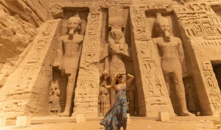 Woman standing in front of the temple of Hathor and Nefertari, Trip to Egypt